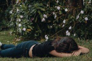 mommy sleeping on the grass