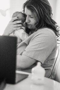 mother tightly hugging her baby-stress 