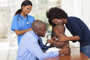 doctor examining a child in a hospital-pediatrician After-Hours Pediatrics-preventative care