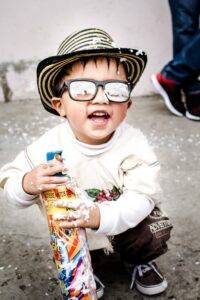 Gingivitis in Children: A Comprehensive Guide to Prevention and Treatment 6 joyful child holding icing spray gingivitis