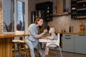 baby being fed by mother guide to budgeting