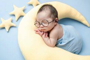 newborn-baby-doctor-adorable-baby-wearing-eye-glass-white-noise