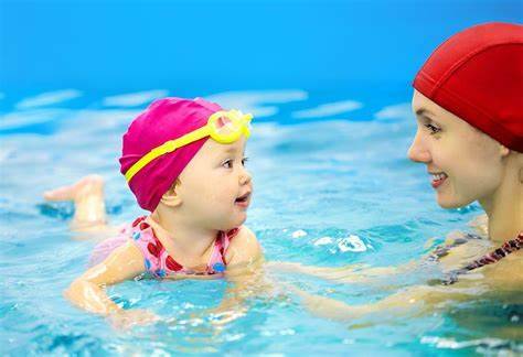 Beat Summer Boredom: 18 Ways to Keep the Kids Engaged 2 summer-teaching how to swim for babies 2 years