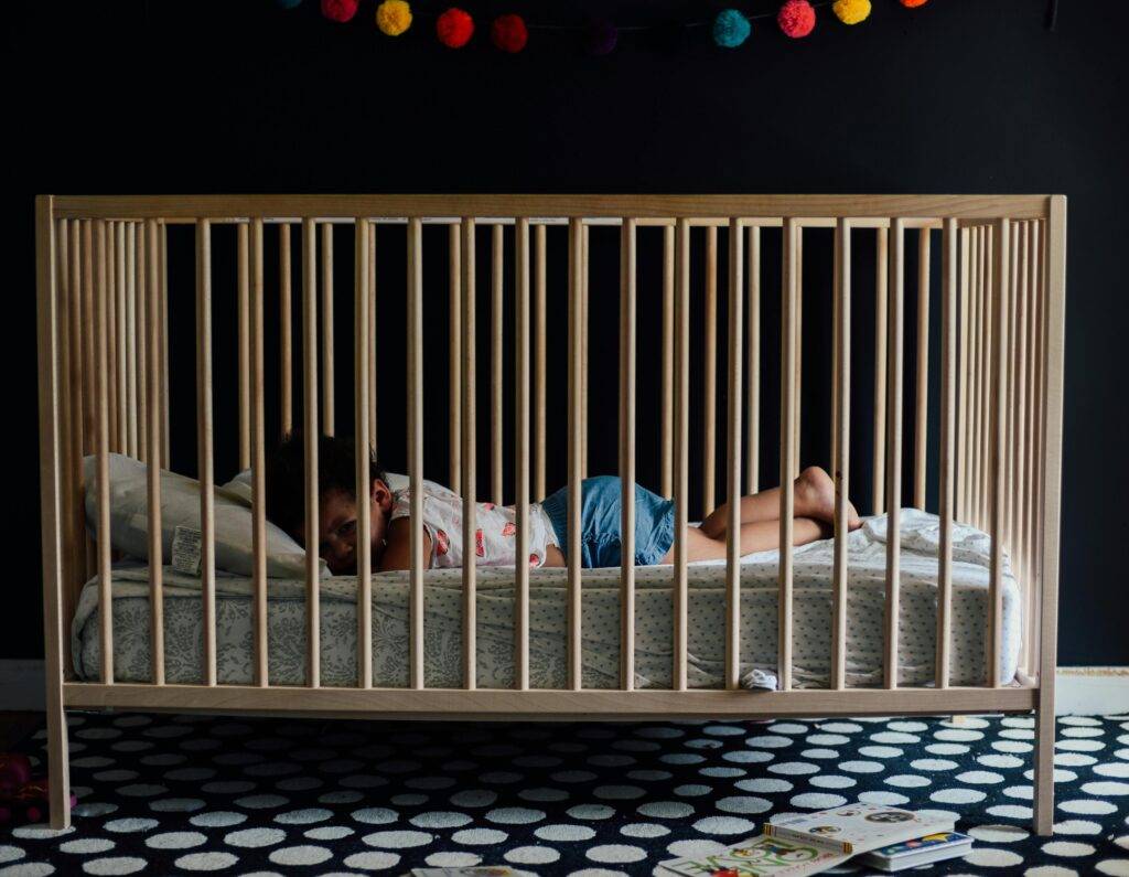 How to get newborn to sleep in a crib