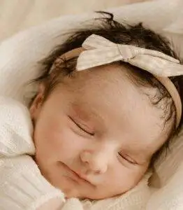 Why Are Some Babies Born With a Full Head of Hair? 3 newborn baby with hair
