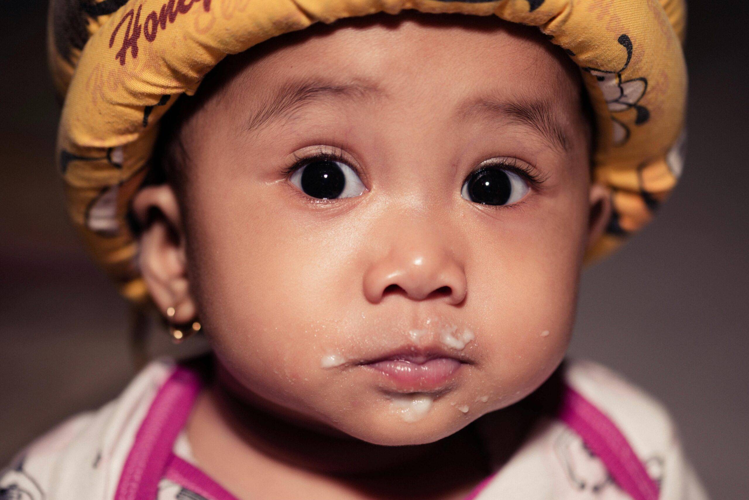 Why Does My Newborn Baby Spit Milk? 7 Essential Causes and Solutions